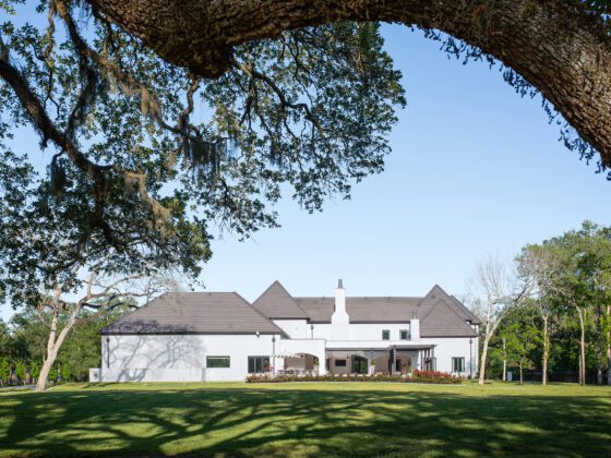 Thompson Lake Residence back elevation under tree