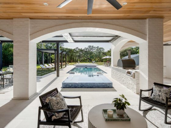 Thompson Lake Residence back porch facing pool