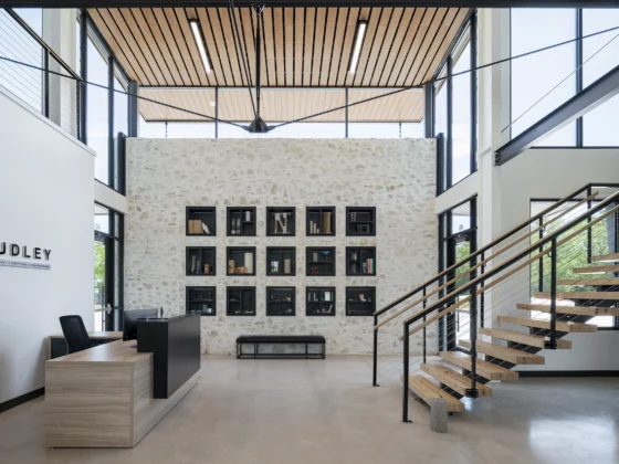 Office lobby with built-in shelf and alot of natural light